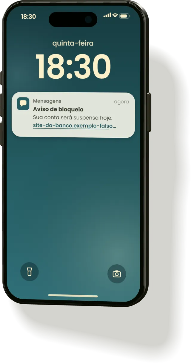 Celular com uma notificação fictícia chamada Aviso de bloqueio, dizendo que a conta será suspensa hoje e trazendo o link site-do-banco.exemplo-falso.